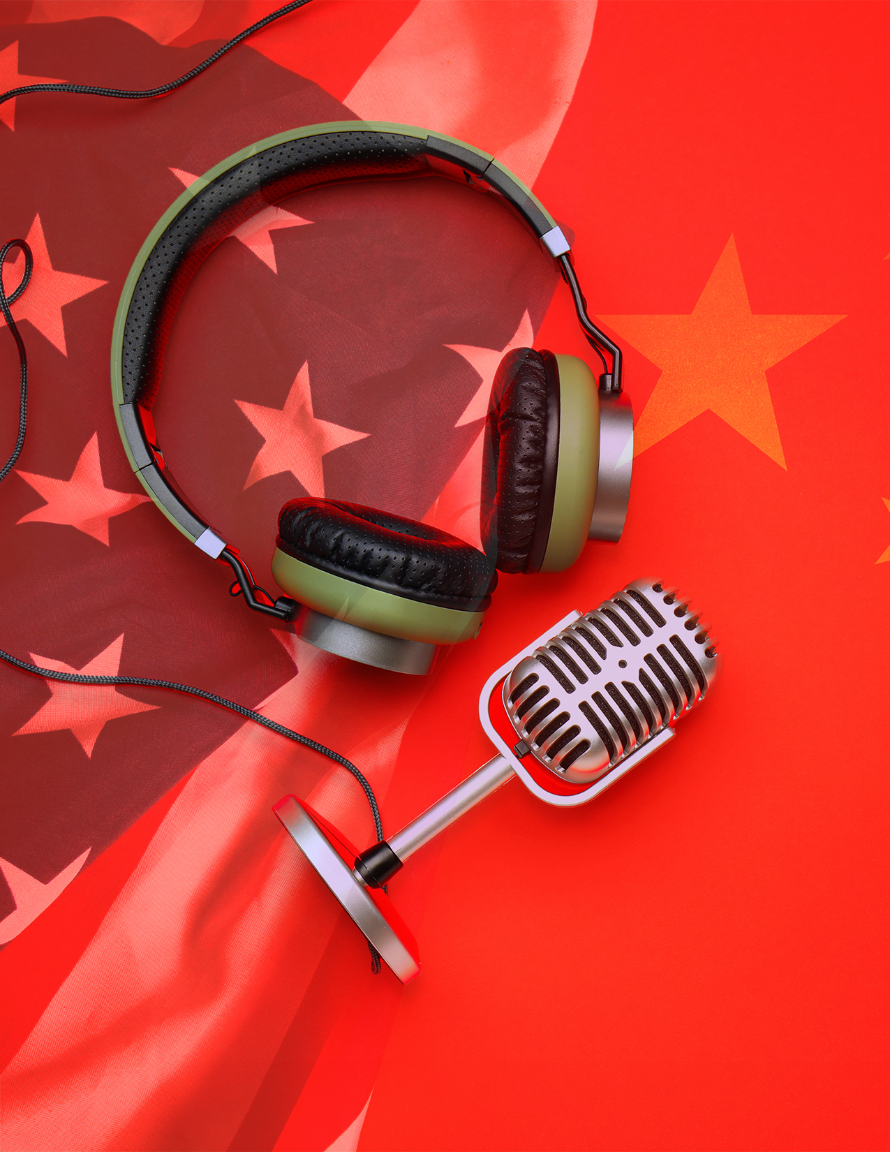 Image of a headset and microphone with a red background featuring the flag of China and the U.S.