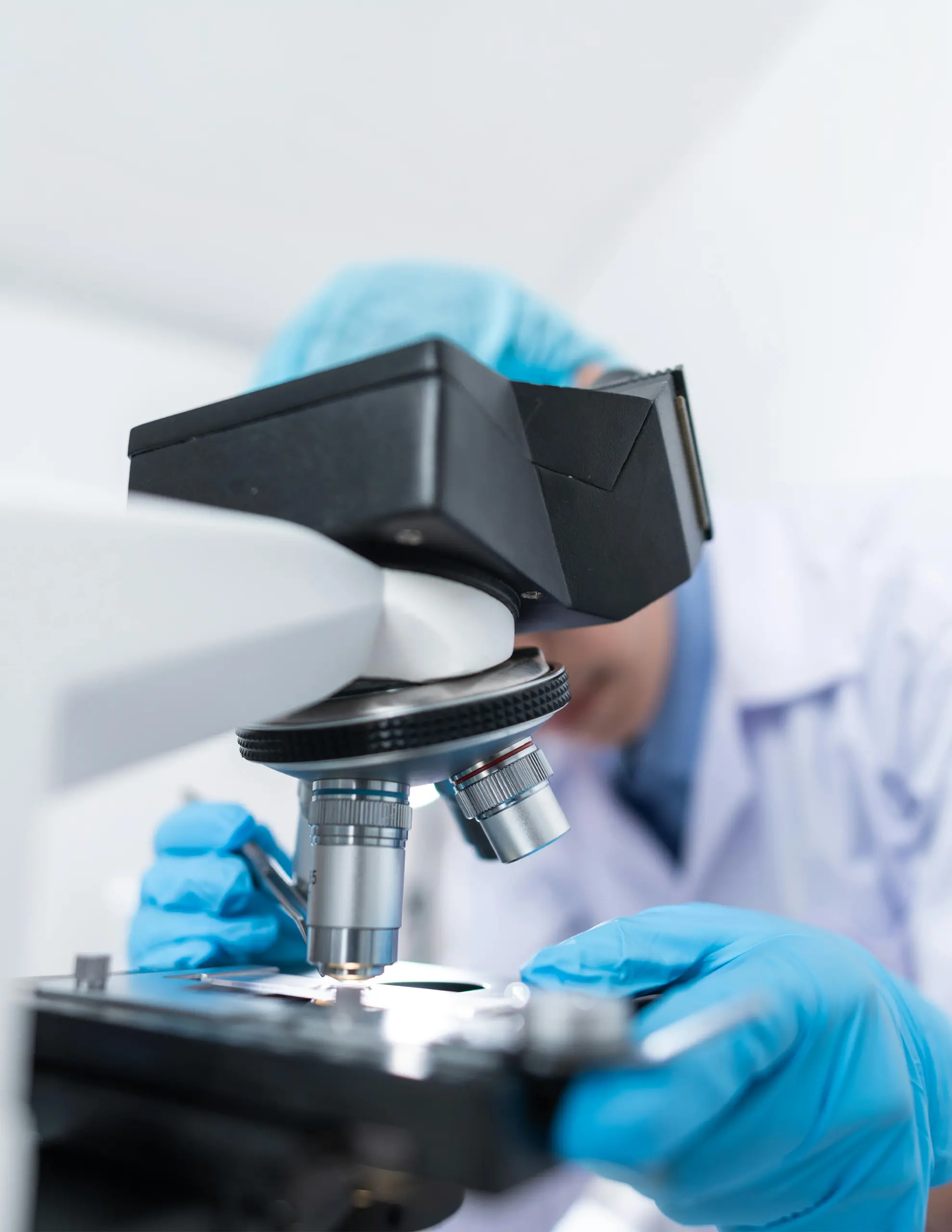 Scientist Using Microscope