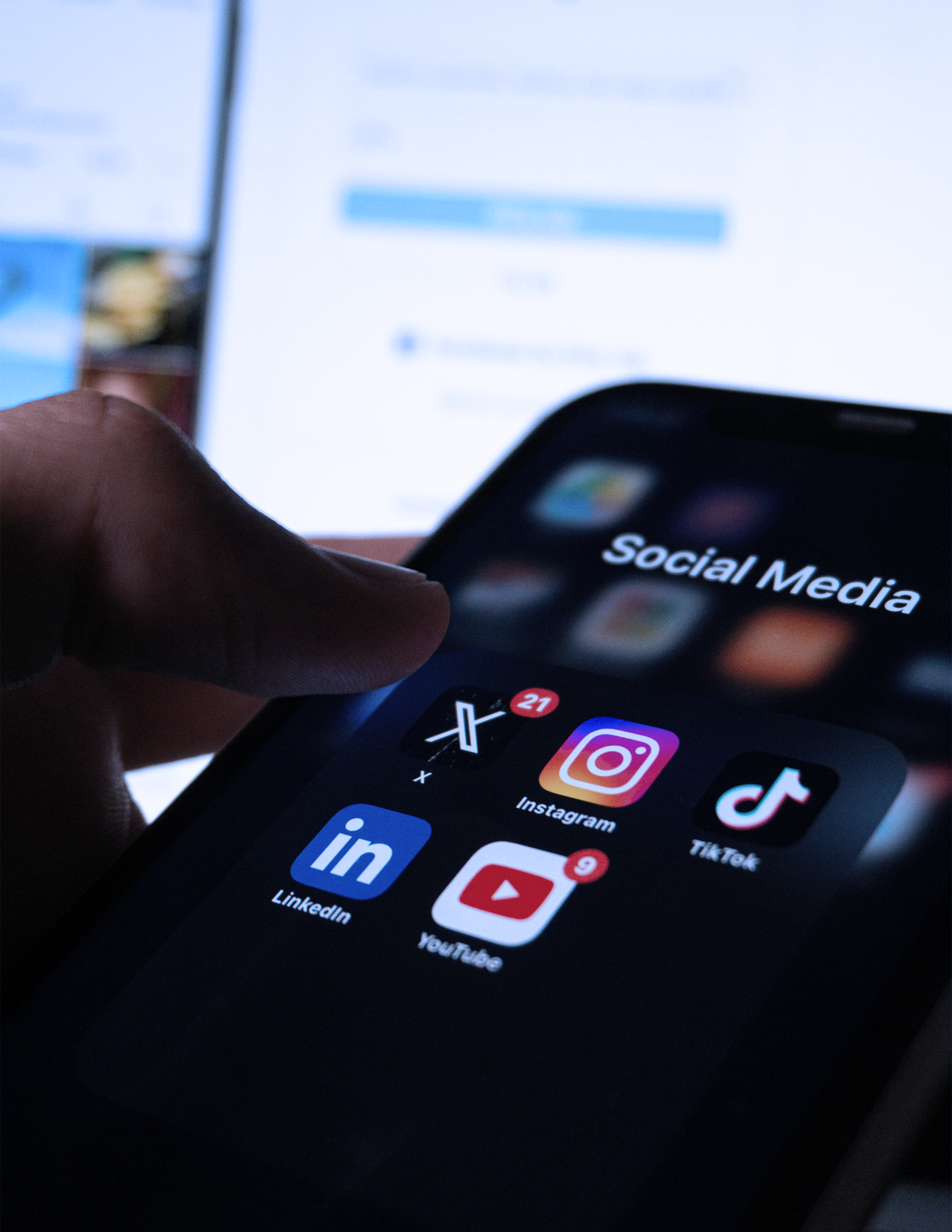 Image of a phone with social media icons